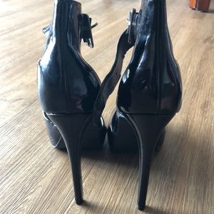 Steve Madden black patent platforms